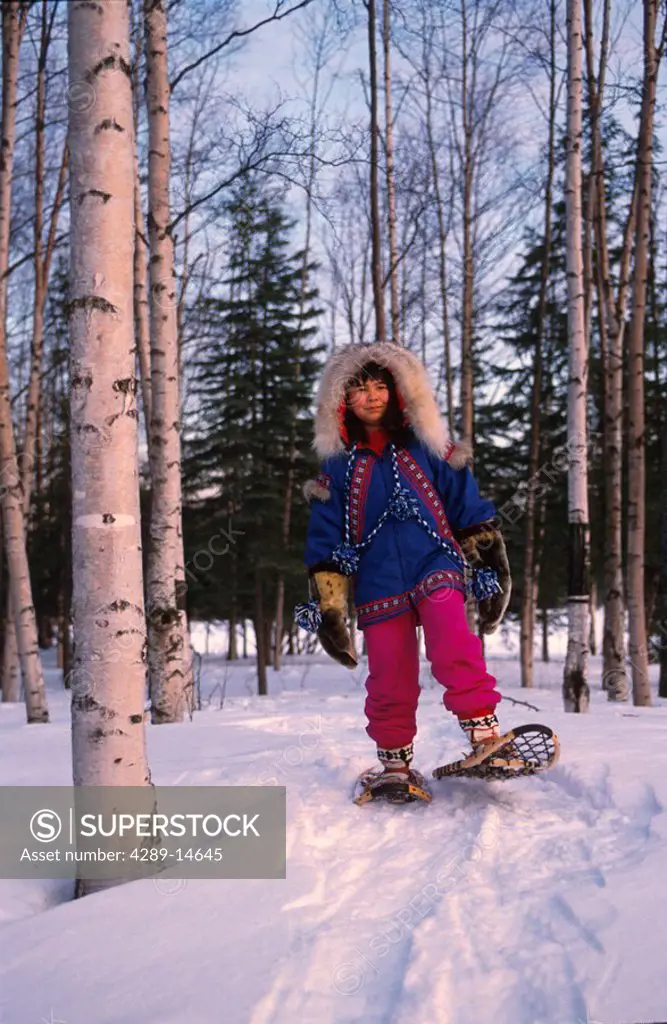 Native Yupik Girl Snowshoes in Traditional dress Alaska
