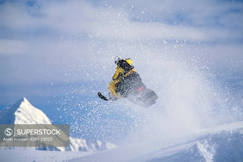 Snowmachiner Jumping Near Lost Lake Area KP Alaska