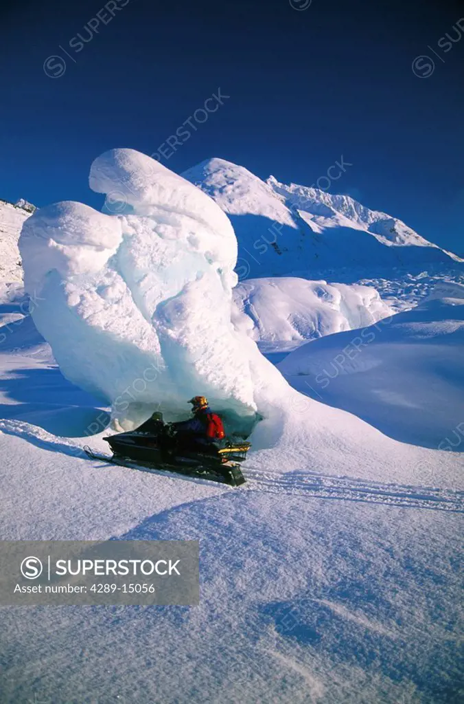 Man Riding Snowmachine Spencer Lake KP AK Winter
