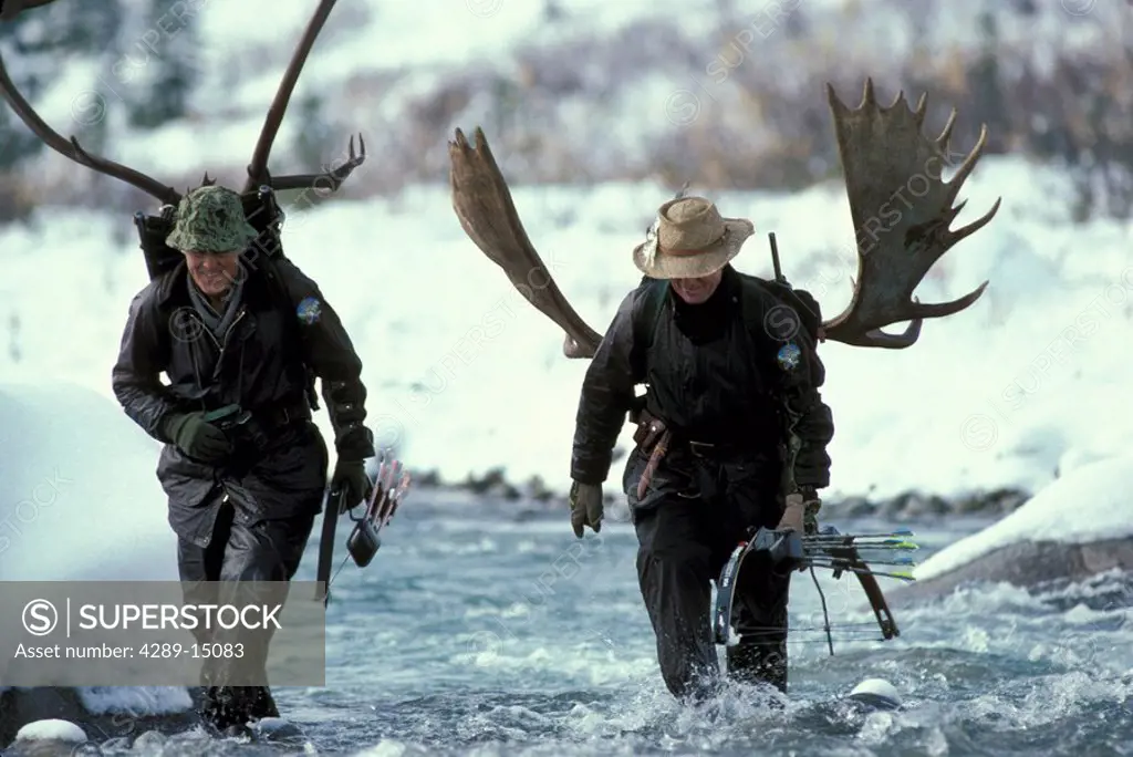 Hunters Packing Antlers & Crossing Stream AK Range