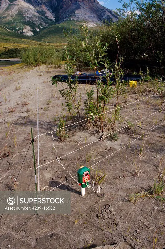 View of a portable electric bear fence set up to protect gear in the Gates of the Arctic National Preserve in Arctic Alaska Summer
