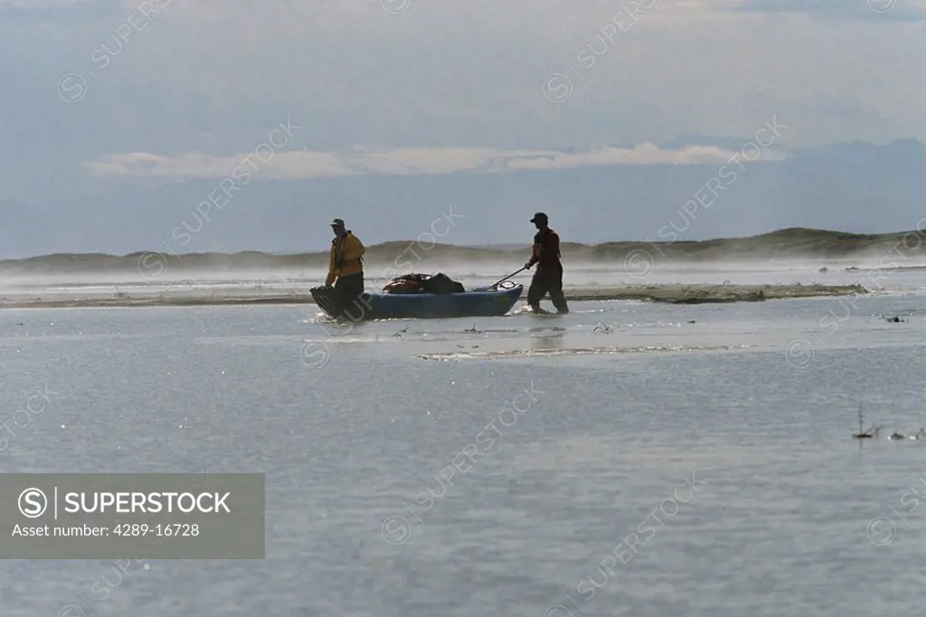 People Drag Raft Through Shallows Hulahula River AK AR Summer Misty Morning