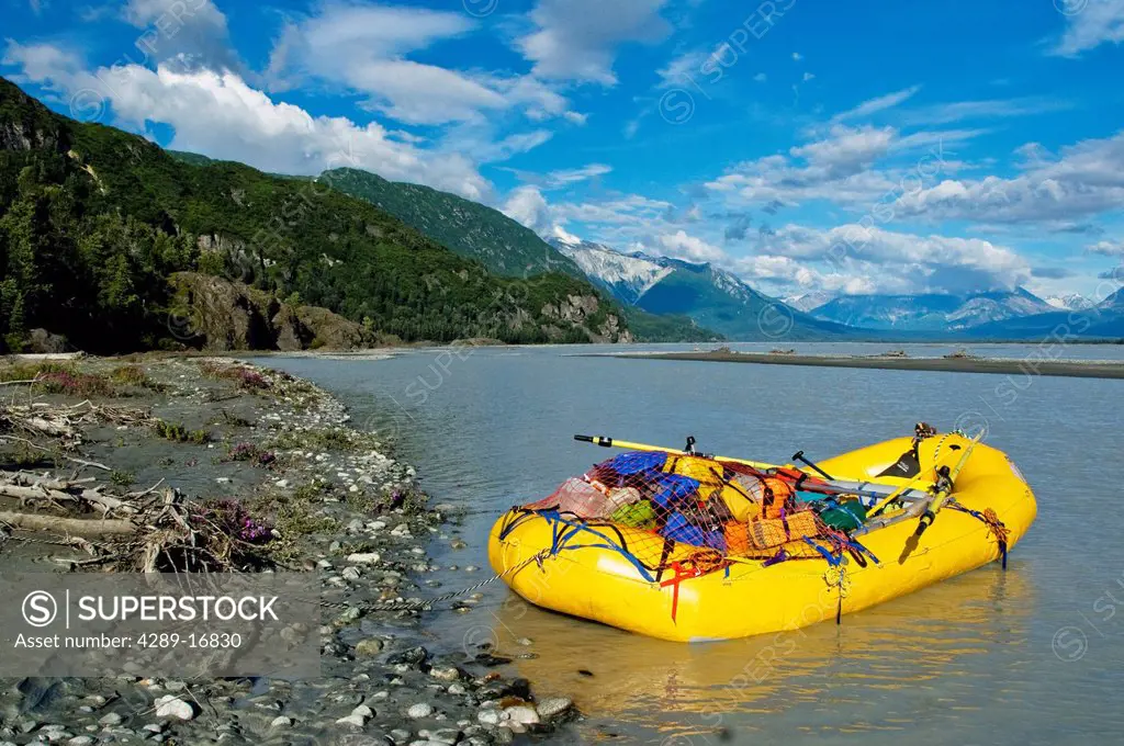 View of a raft packed with gear on Chive Beach on the Tatshenshini River, Tatshenshini_Alsek Provincial Park, British Columbia Canada, Summer
