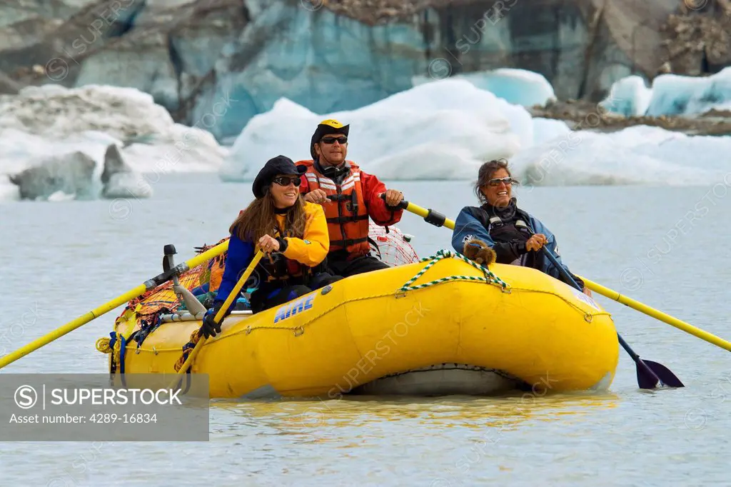 Group river rafting on the Alsek River by Alsek and Walker Glaciers, Glacier Bay National Park, Summer