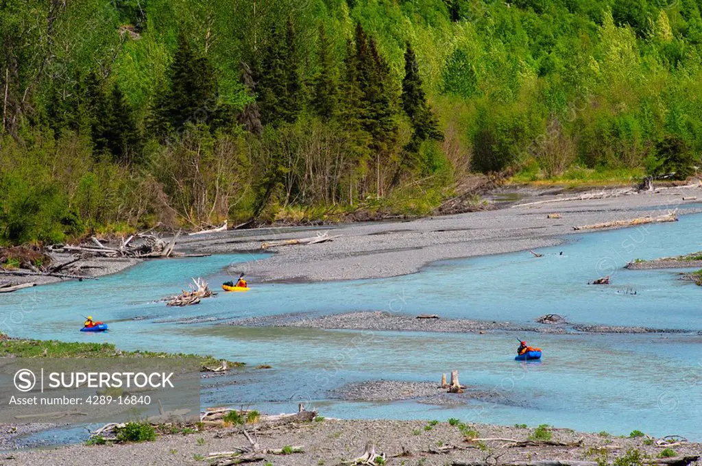 Pack rafters floating down Eagle River in Chugach State Park, Southcentral Alaska, Summer