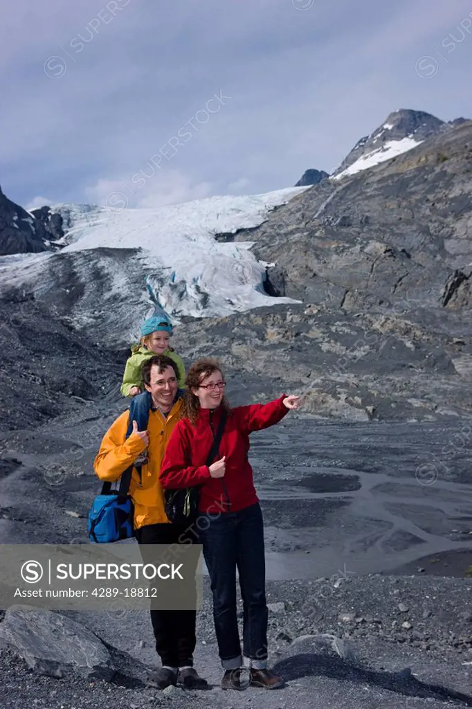 Family hiking on a path in front of the Worthington Glacier, Chugach National Forest, Southcentral, Alaska