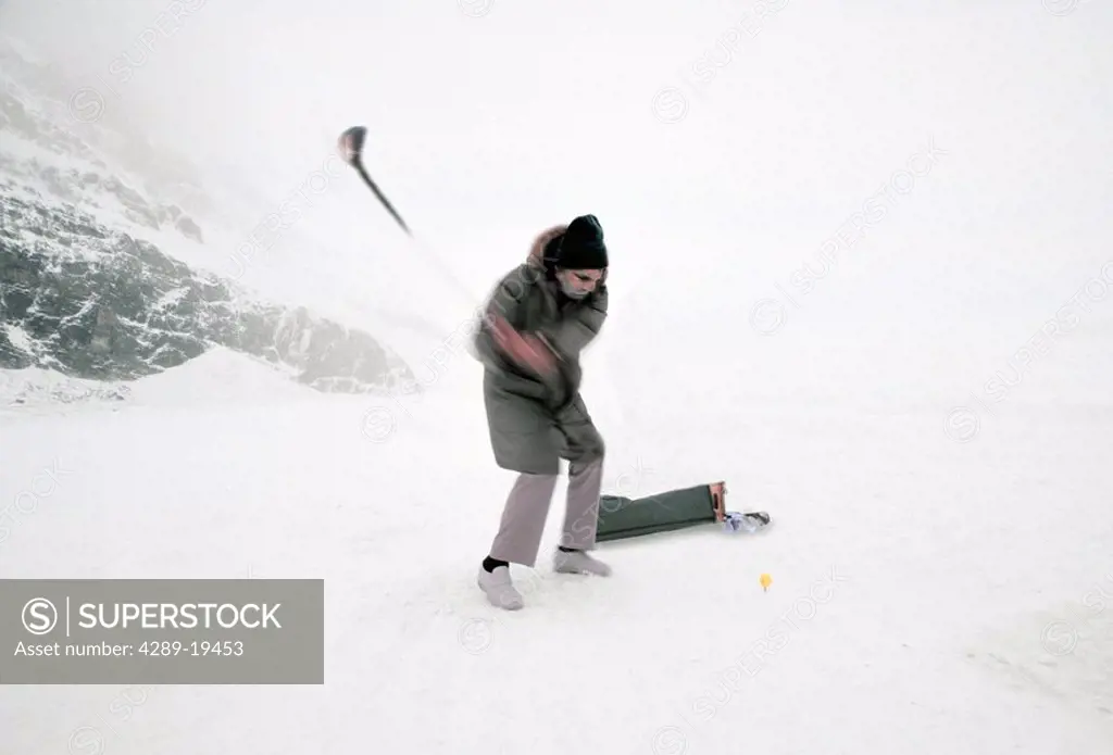 Man Golfing in Bad Weather Winter Digital Composite