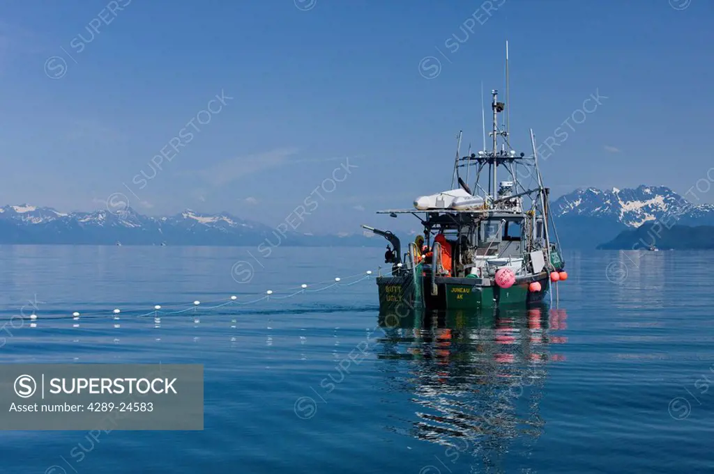 A commercial Gill Net fisher works the calm waters of Lynn Canal in Alaska´s Inside Passage, near Juneau.