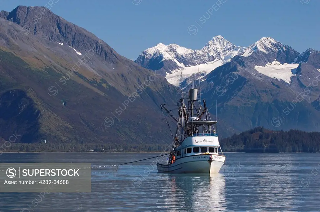 Commercial fishing boat *Steven Daniel* hauling in net Port Valdez Prince William Sound Alaska Autumn