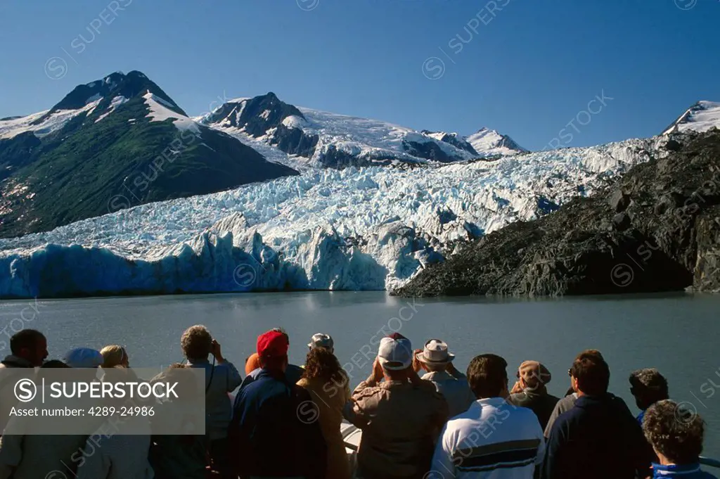 Visitors view Portage Glacier from tour boat