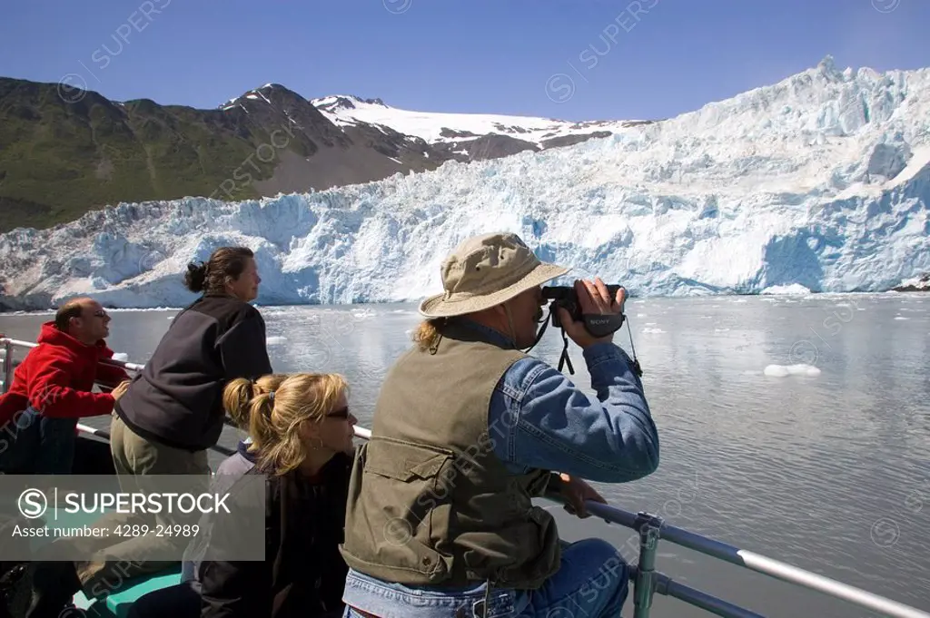Visitors on tourboat view Aialik Glacier Kenai Fjords National Park Kenai Peninsula Alaska Summer