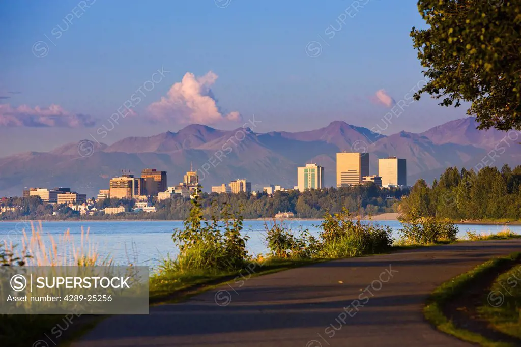 View of Anchorage skyline at sunset from the Tony Knowles Coastal Trail, Anchorage, Southcentral Alaska, Fall