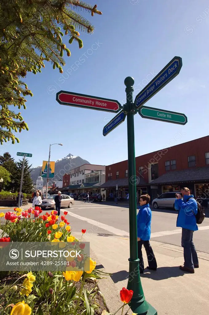 Tourist take pictures of town square in Sitka, Alaska during Summer