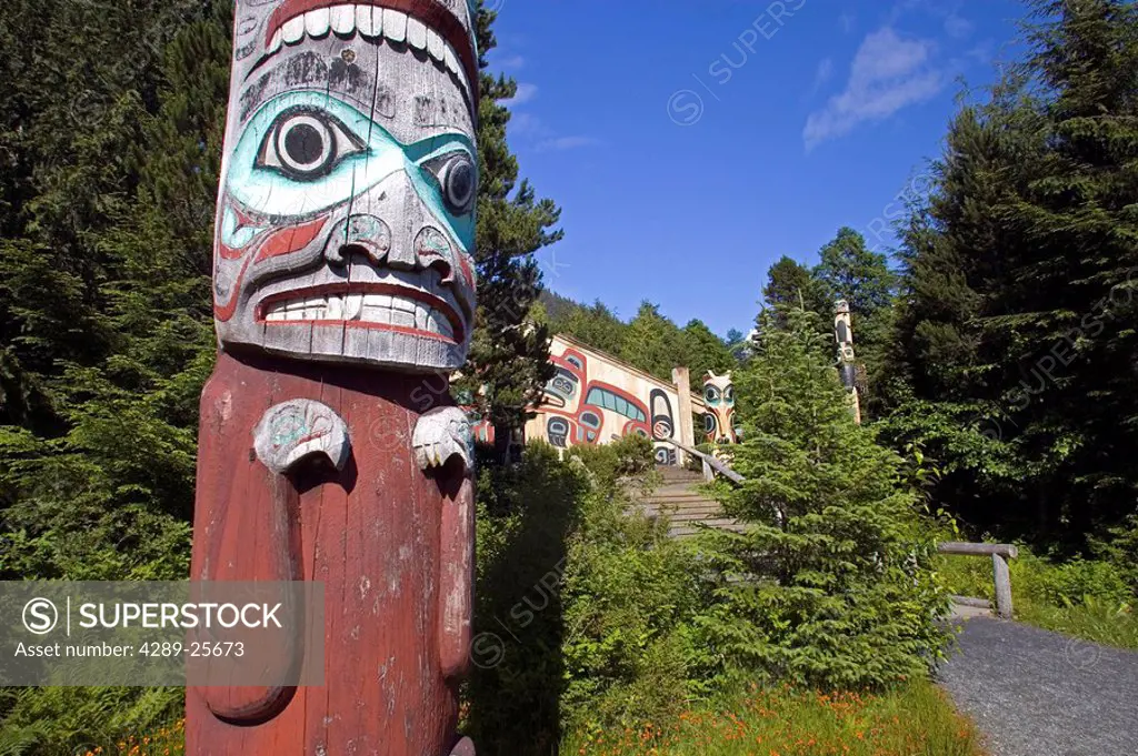 Totem poles & Clan House @ Saxman village near Ketchikan Alaska Southeast Summer Tongass National Forest
