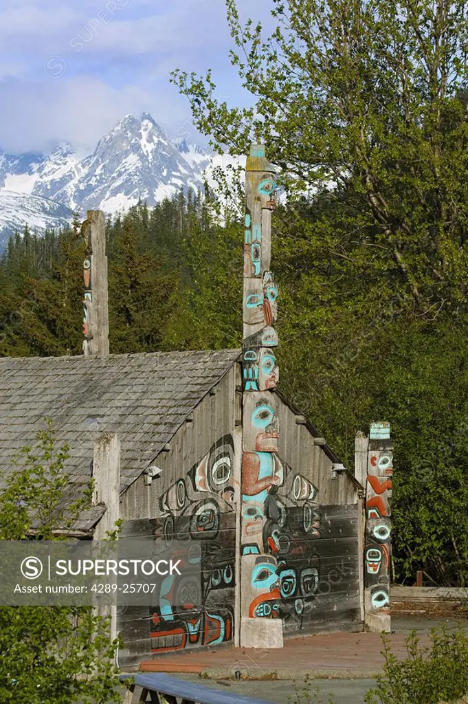 Tlingit tribal house at Fort Seward with Chilkoot Range in the background, Haines, Alaska