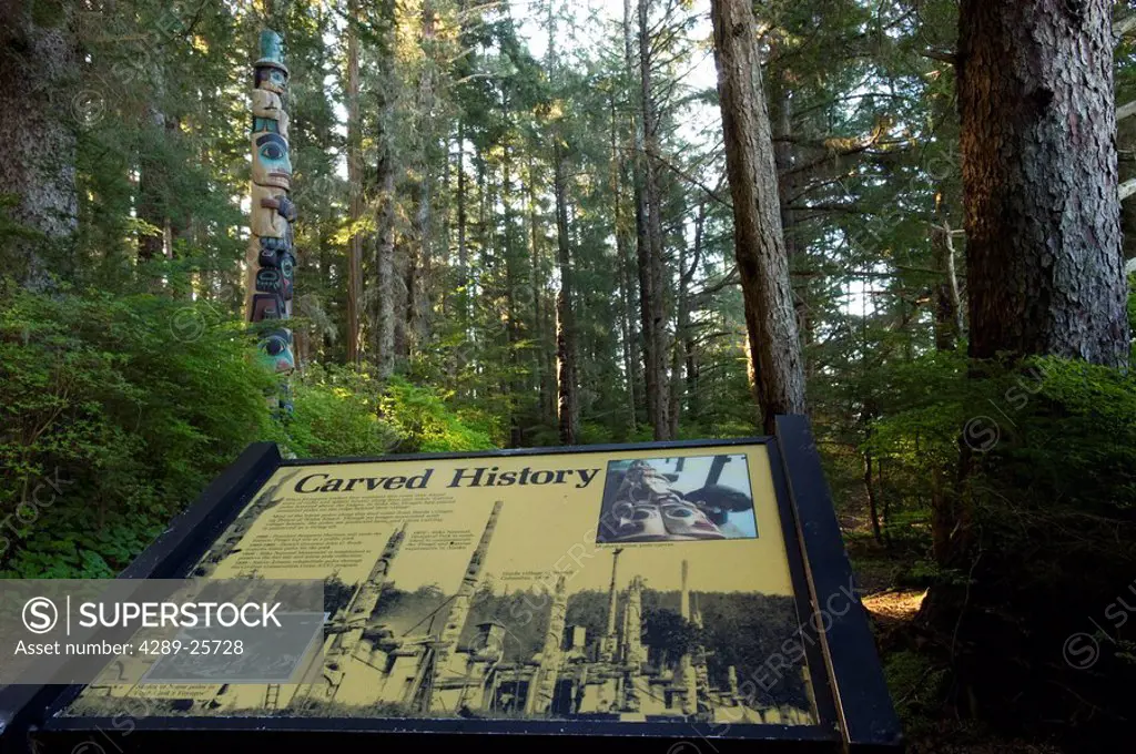 A sign along the trail provides information about totems in the Sitka National Historic Park, Alaska