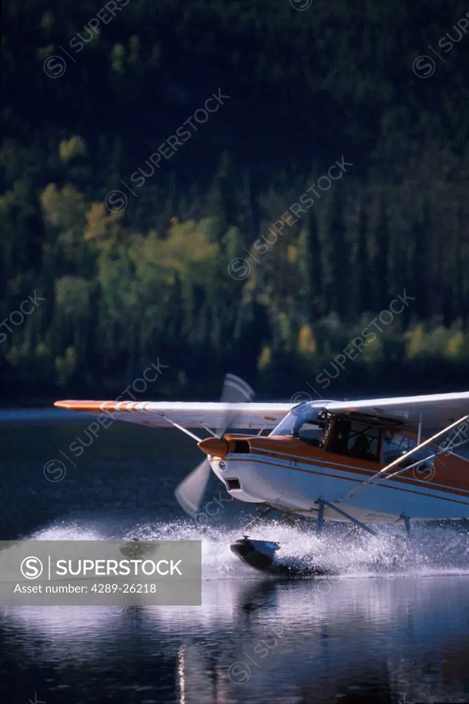 Floatplane Landing on Lake Brooks Range Arctic AK summer portrait Gates of the Arctic NP