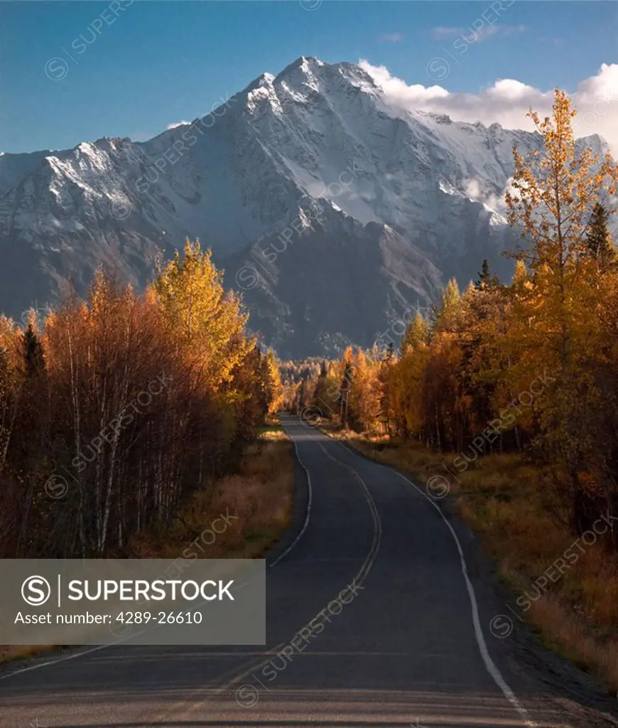 Scenic view of Pioneer Peak and rural road during Autumn, Southcentral Alaska