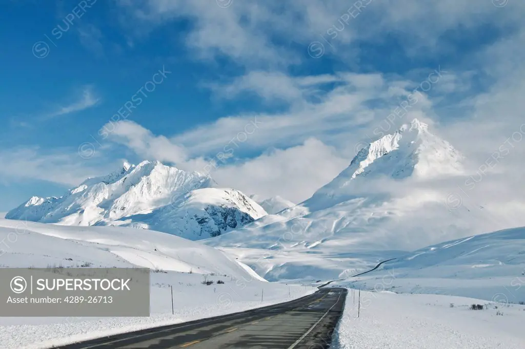 View of the Haines Highway, or Haines Cut_Off, at the base of the Alsek Range in Tatshenshini_Alsek Wilderness Provincial Park, British Columbia, Cana...