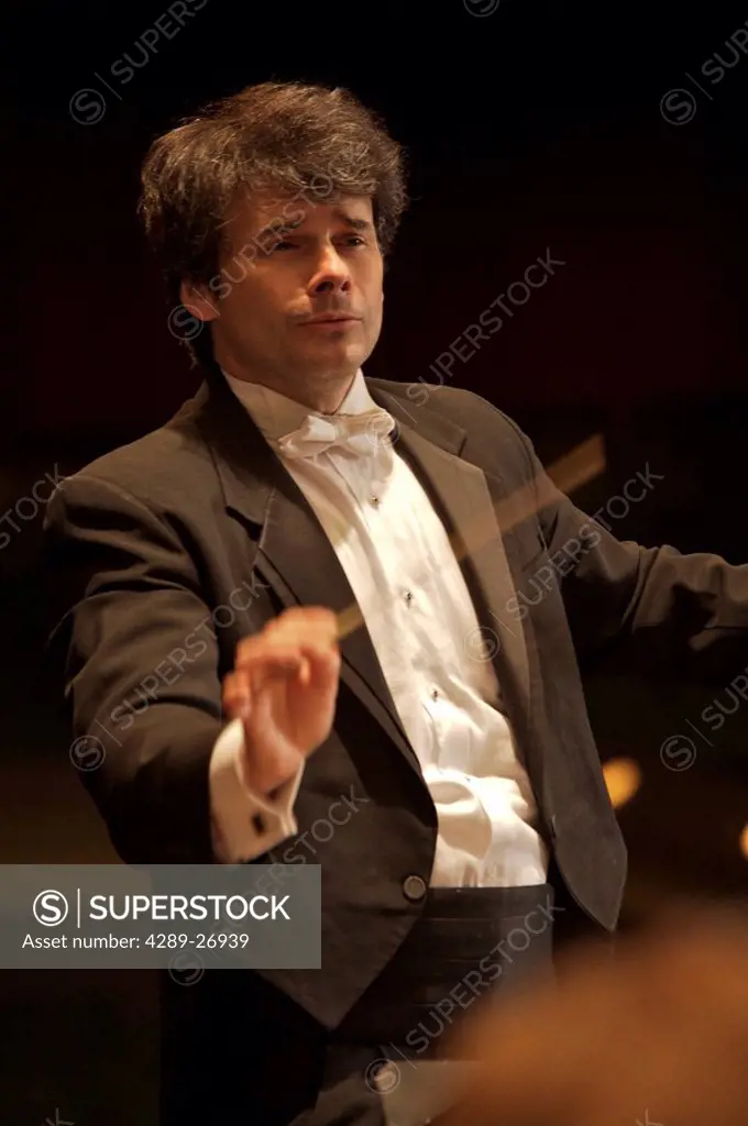 Conductor conducts the Anchorage Symphony Orchestra