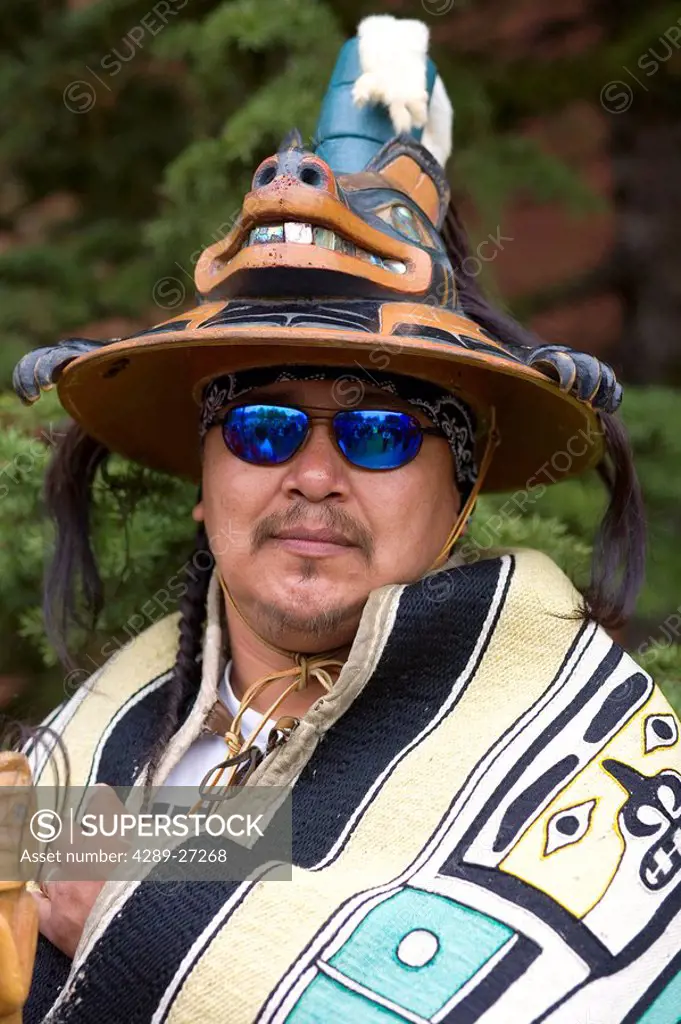 Tlinget Indian from the village of Angoon wearing Brown Bear clan hat member of Daaxaat Kanadaa dance group Alaska southeast Summer