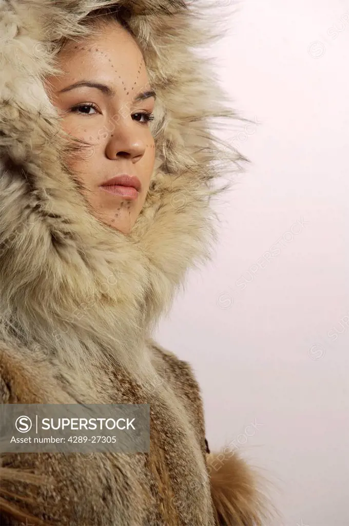 Portrait of Native Alaskan Inupiat Woman in Wolf Fur Coat in Studio Alaska