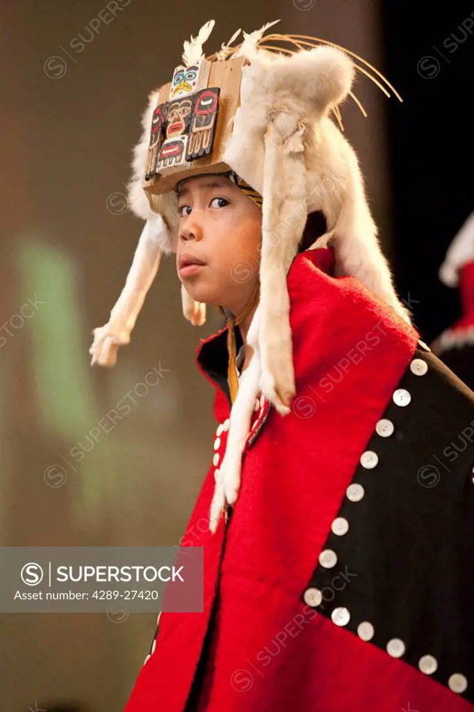 Young Tlingit dancer with ermine headdress at AFN Conference, Anchorage, Alaska