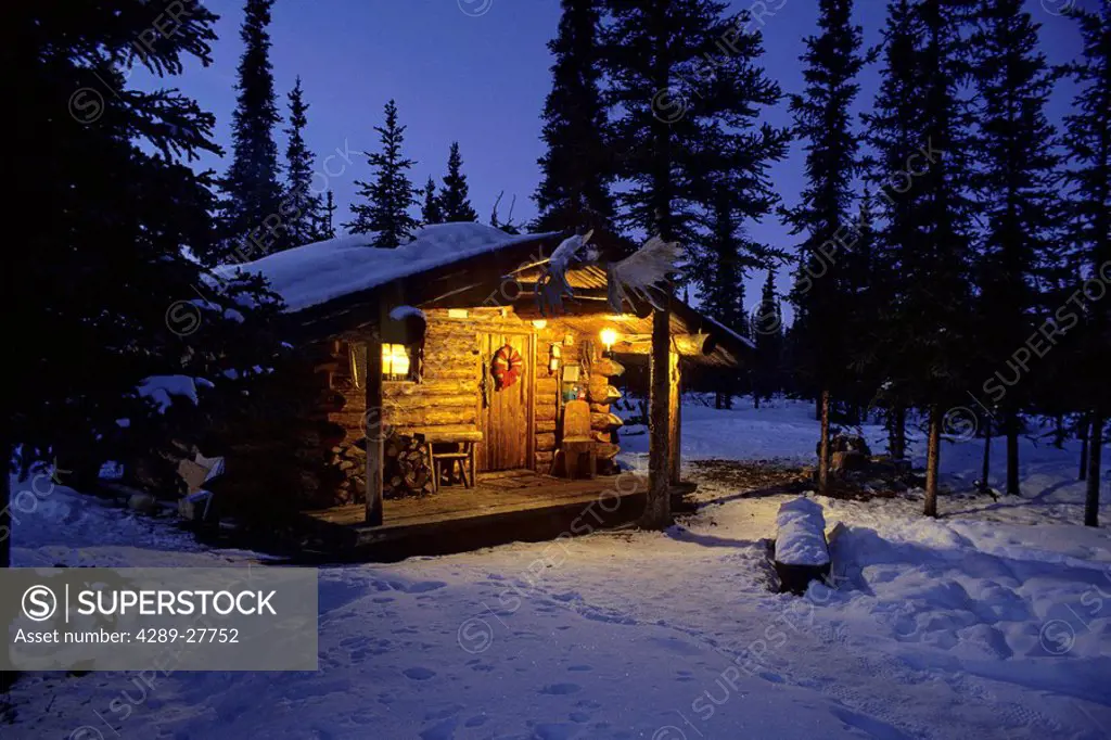 Interior Alaska Log Cabin Forest Winter Porch Light Snow Sky Dusk