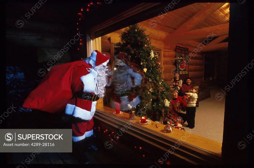 Santa Claus Looking in Cabin Window at Family Girdwood Ak Christmas Tree Southcentral