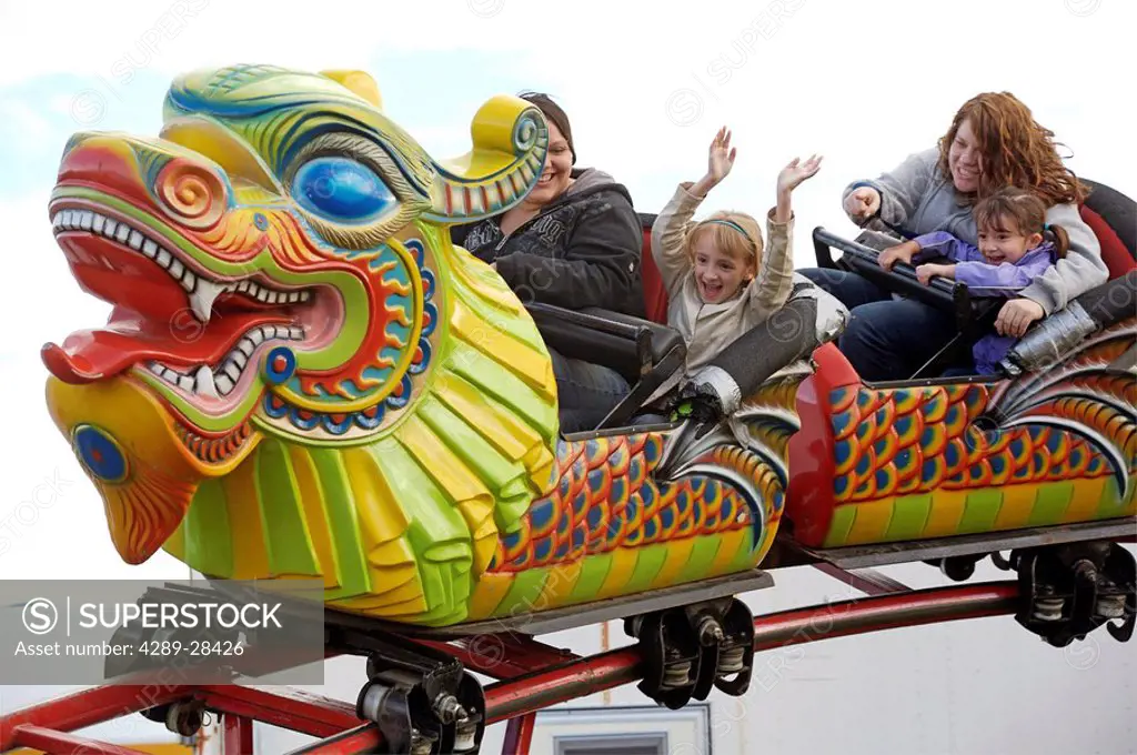 Mother & child on Dragon roller coaster at Alaska State Fair Palmer Alaska