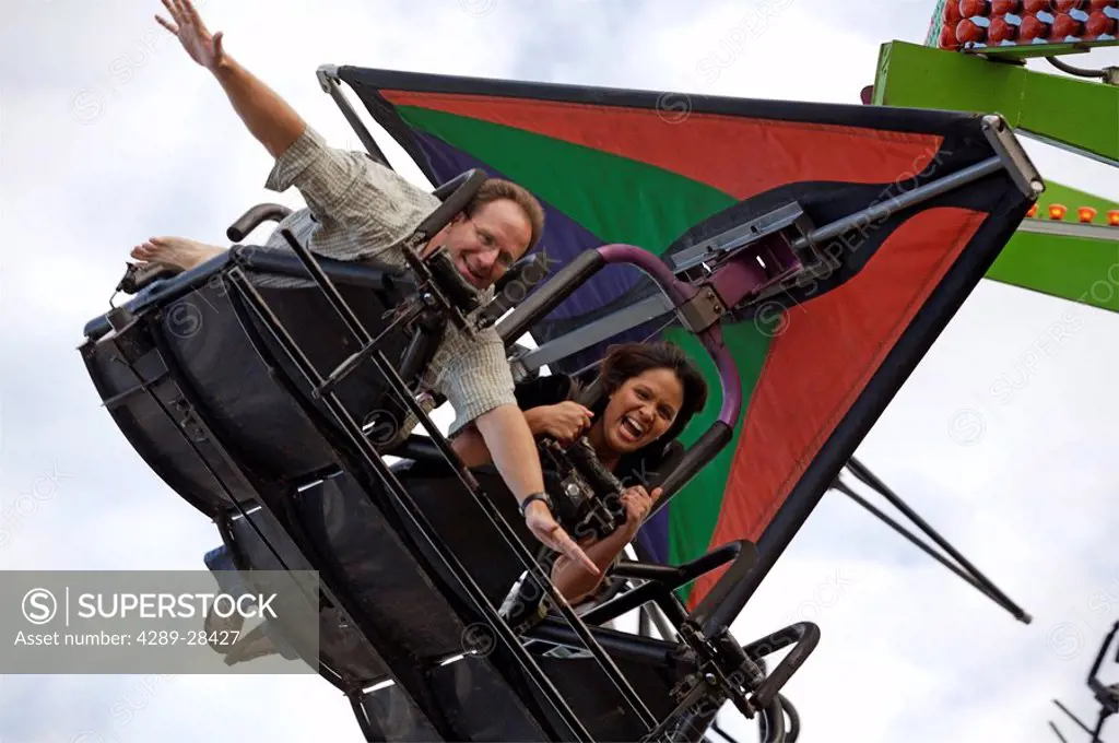 Husband & wife on kite ride at Alaska State Fair Palmer Alaska