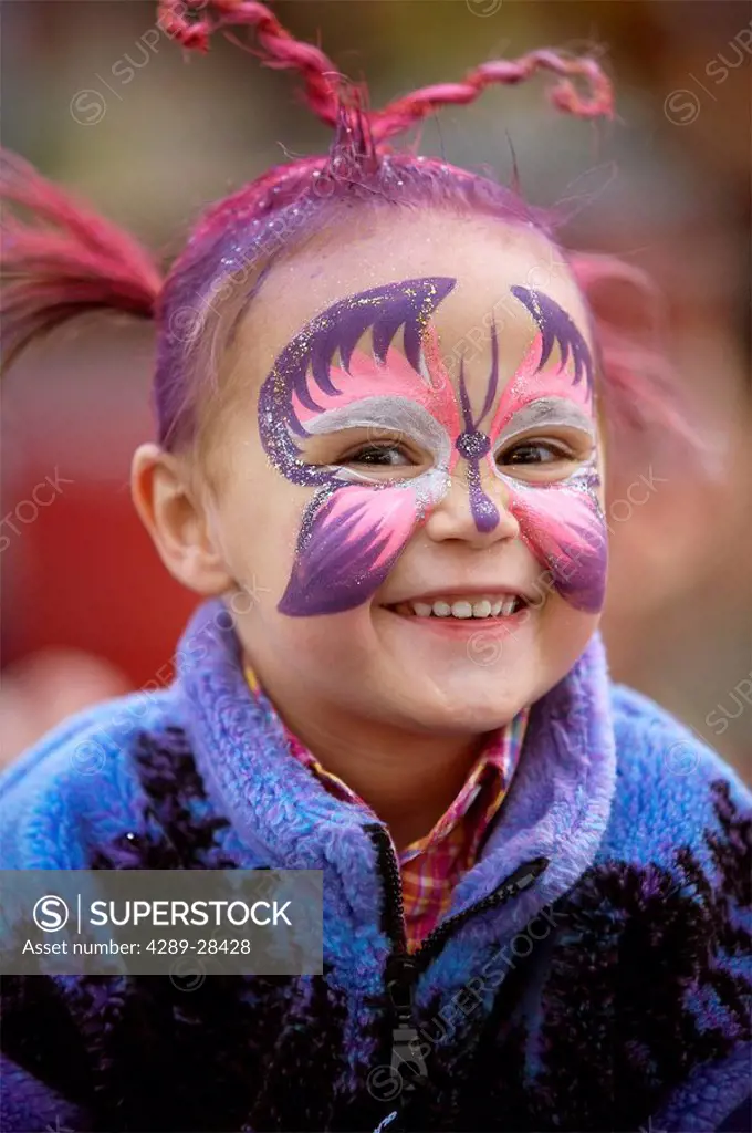 Portrait of young girl with painted face at Alaska State Fair Palmer Alaska