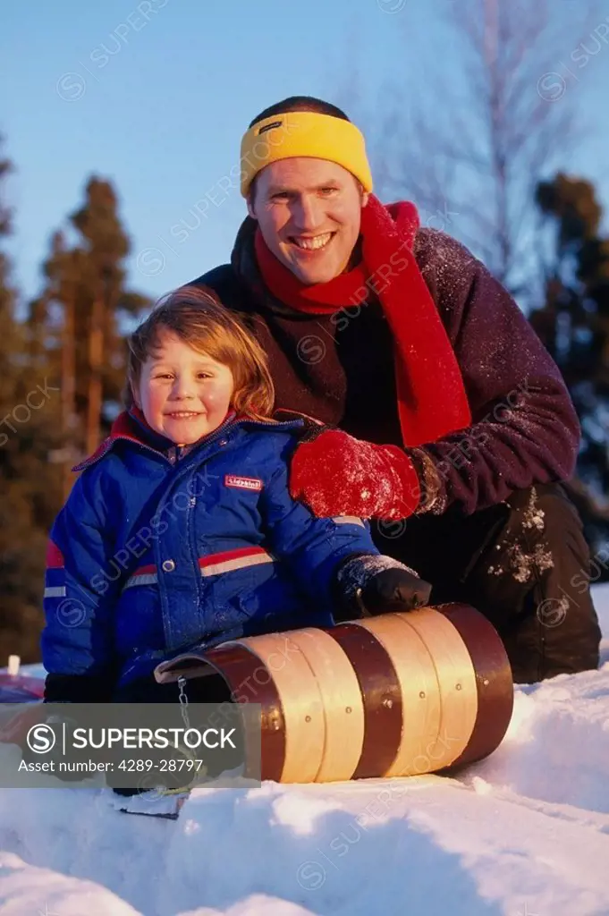 Father and Son Sledding Russian Jack Park SC AK Winter