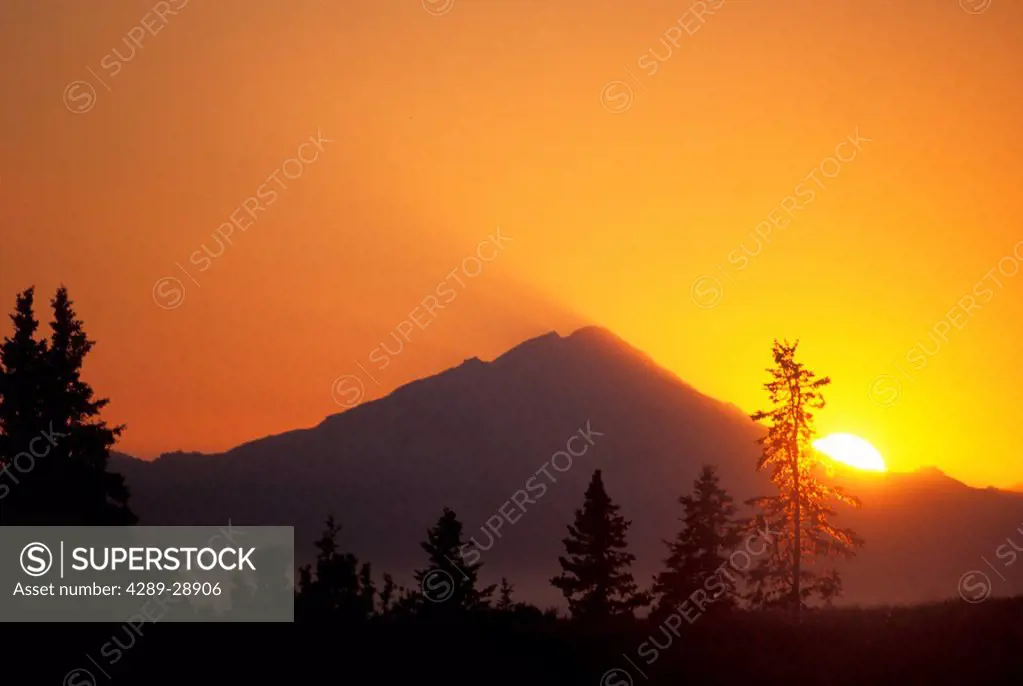 Sunset over Mt. Redoubt in Lake Clark National Park as seen from the Kenai Peninsula, Alaska