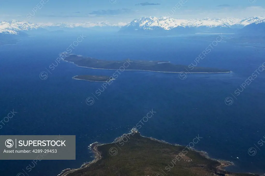 Aerial view of the north end of Admiralty Island Point Retreat and Mansfield Peninsula with Lynn Canal and Lincoln Island in the background, near June...