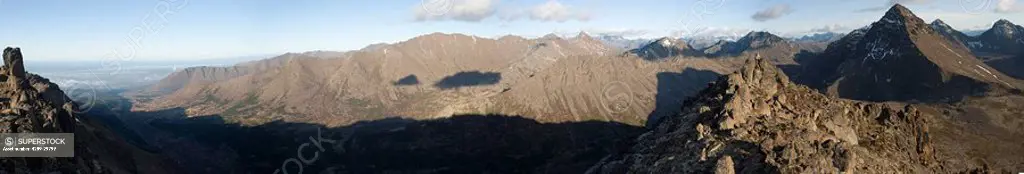 Panorama landscape of the Front Range Chugach Mountains overlooking Anchorage, with Ptarmigan Peak at right. Late Summer, Glen Alps area, Chugach Stat...