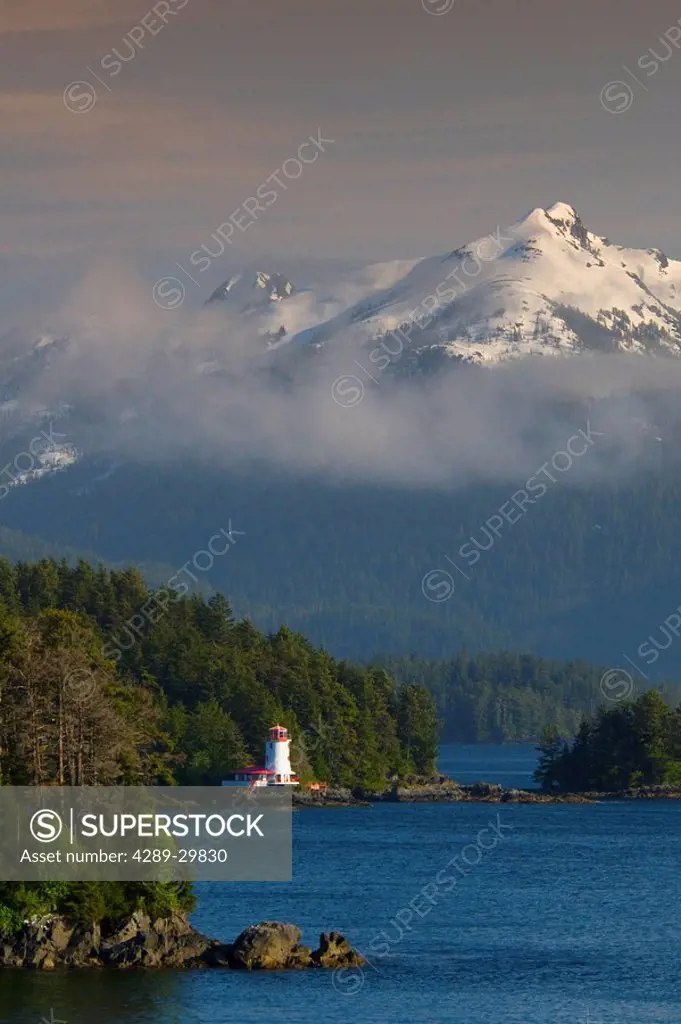 Scenic view of islands and the Rockwell lighthouse near Sitka, Alaska