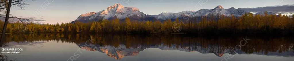 Panorama scenic view of Pioneer Peak reflecting in Echo Lake at sunset, Southcentral, Alaska