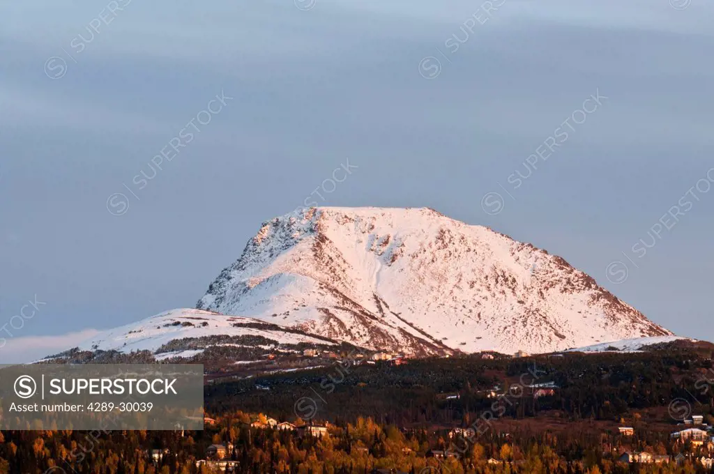 Sunset view of snowcapped Flattop Mountain and the Anchorage Hillside, Southcentral Alaska, Fall/n