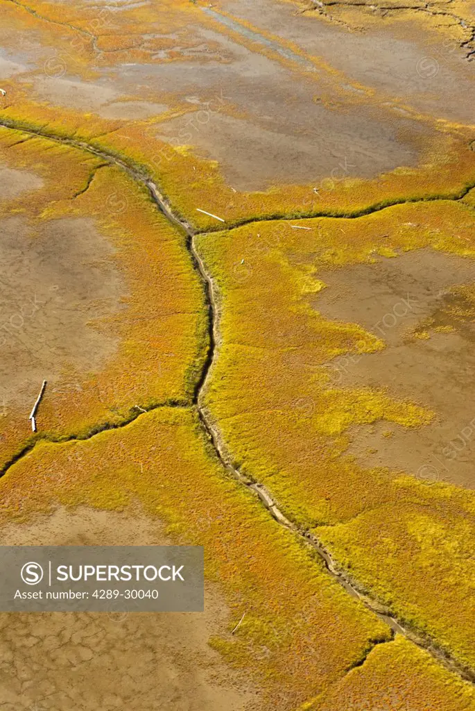 Aerial view of the colorful mud flats off Cook Inlet near Anchorage, Southcentral Alaska, Fall/n