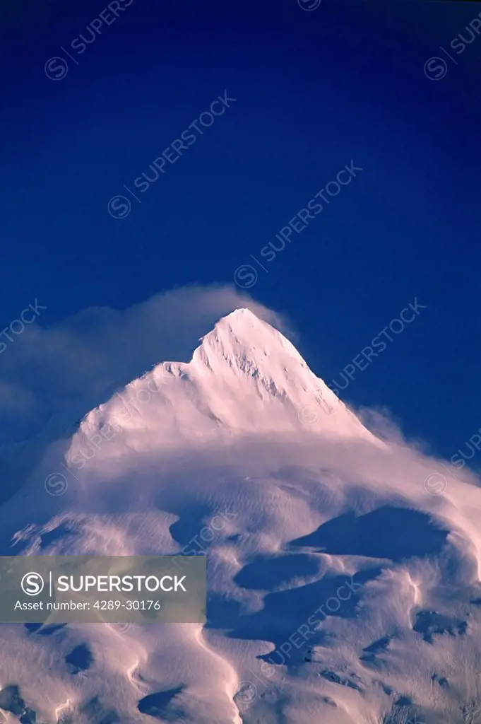 Sunlit Snow Covered Face of Mt Alpenglow Chugach Mtn AK SC Winter