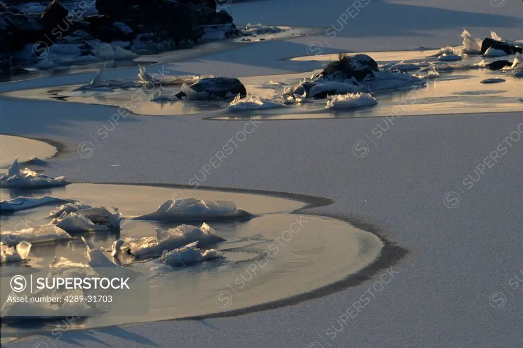 Backlit Tidewater Ice on Shoreline of Sitka SE AK Winter