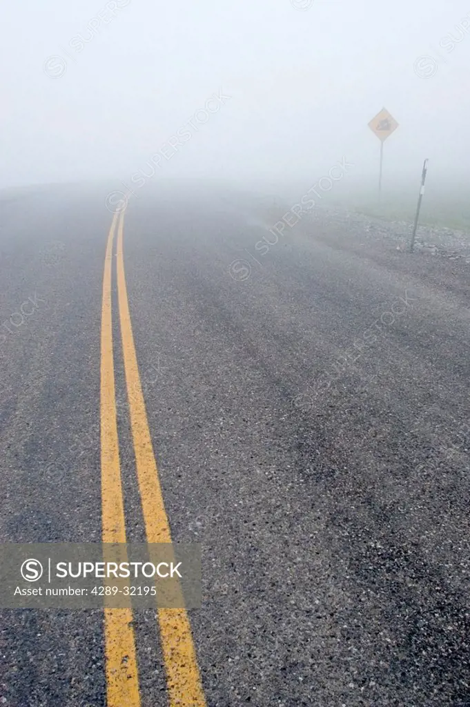 View of fog shrouded Dalton Highway North Slope Arctic Alaska Summer