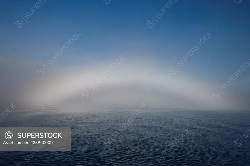 A fogbow appears over the horizon in Prince William Sound during Autumn in Southcentral Alaska