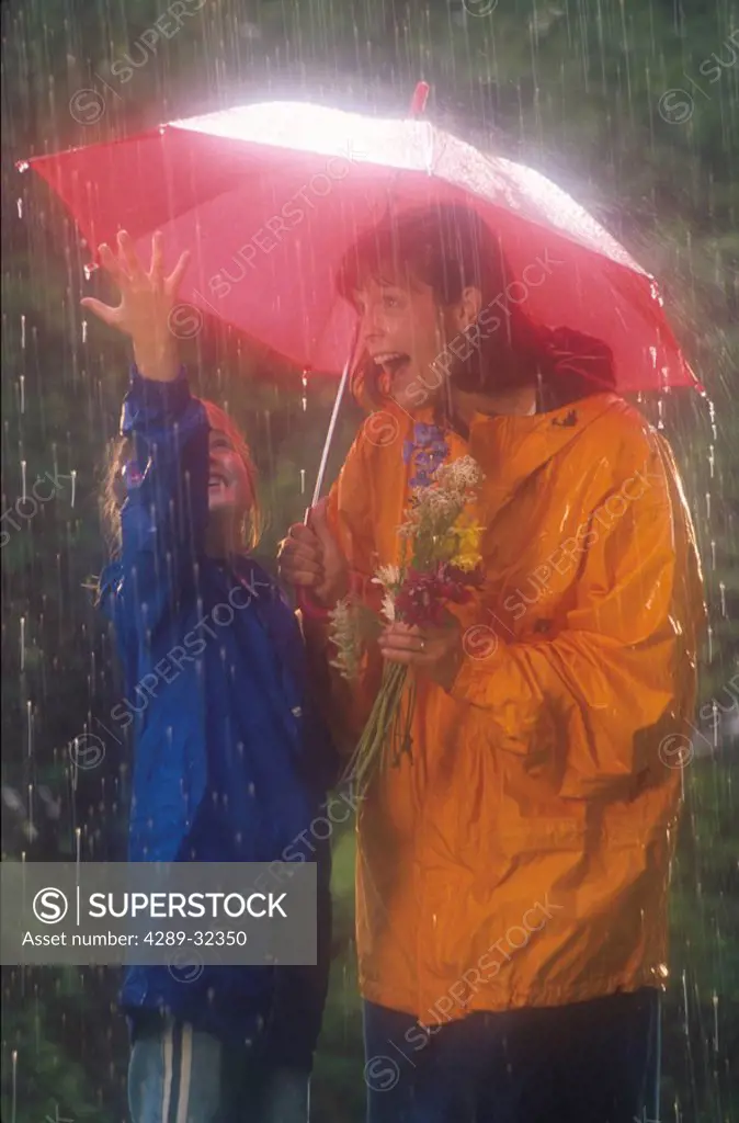 Girl & Mom w/ Umbrella in Rain Spring Southcentral AK