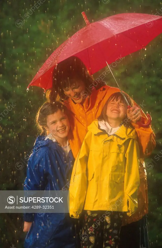 Girls & Mom w/ Umbrella in Rain Spring Southcentral AK