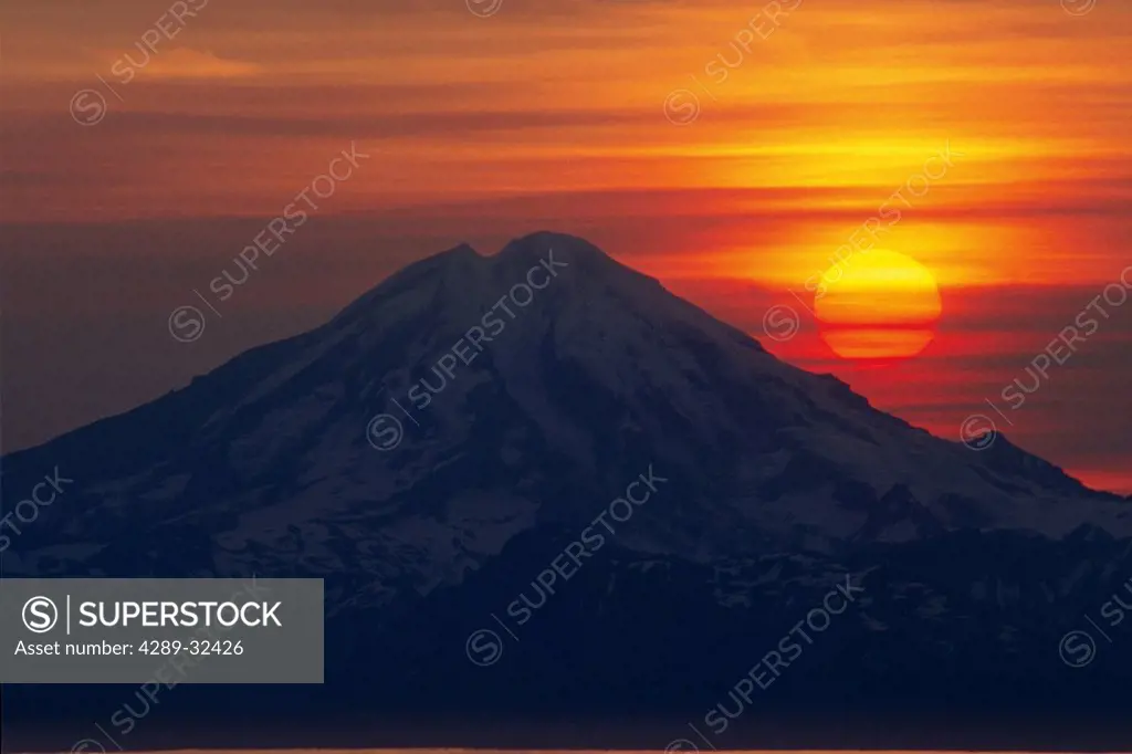 Forest fire smoke adds a dramatic effect to sunset behind Mt. Redoubt in Southcentral Alaska, Summer