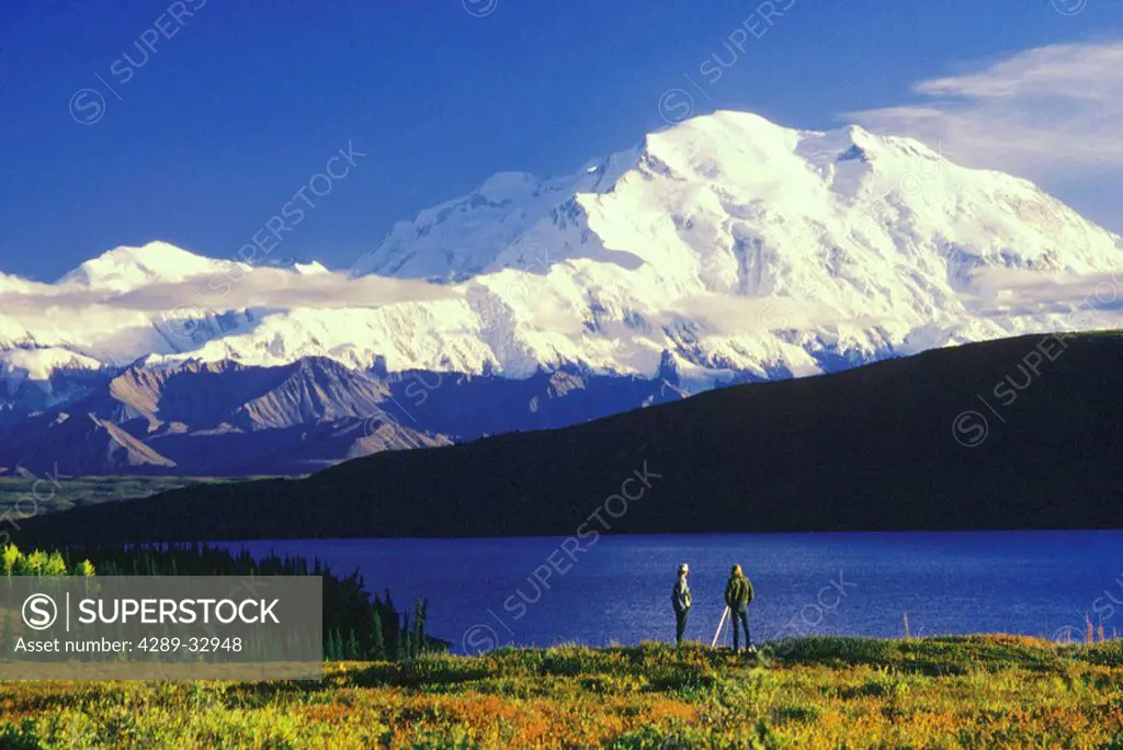 Photographers shooting Mt McKinley Wonder Lake Int AK Denali Natl Park fall scenic