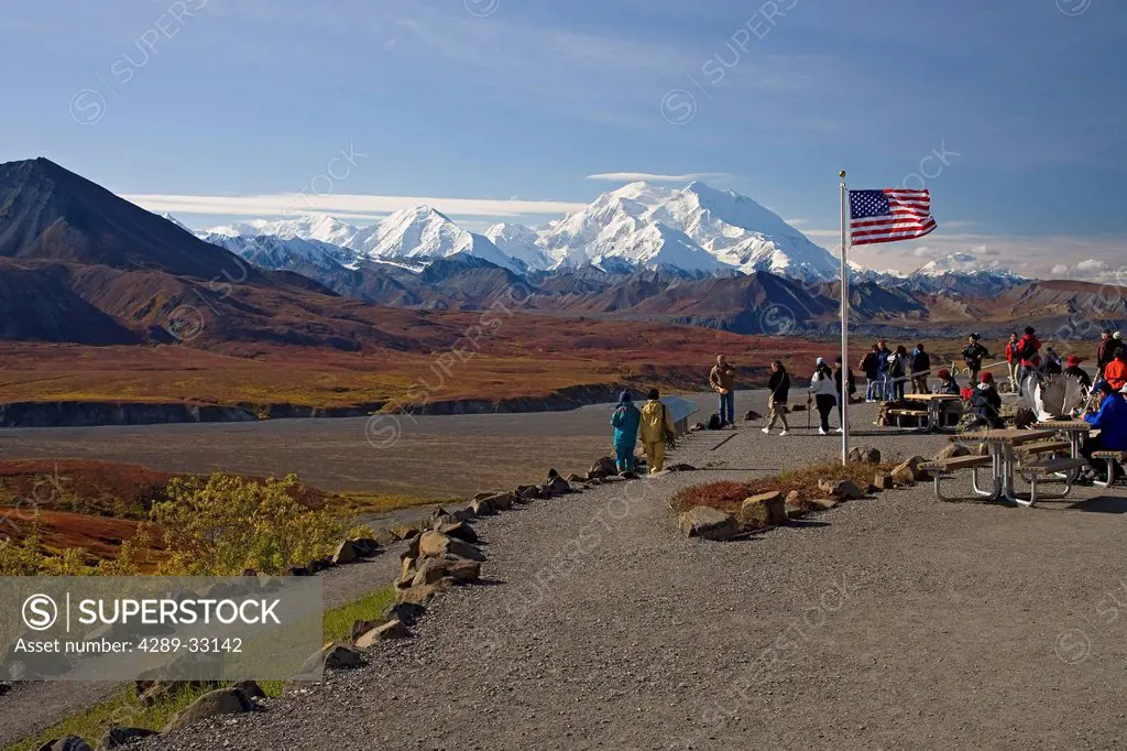 Group of tourists view Mt. McKinley on a clear day from the Eielson Visitor Center, Denali National Park, Interior Alaska, Fall