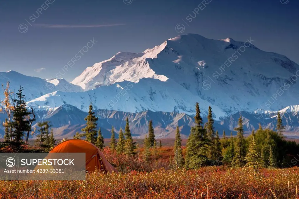 Scenic view of Mt. McKinley in the morning with tent in the foreground, Denali National Park, Interior Alaska, Autumn